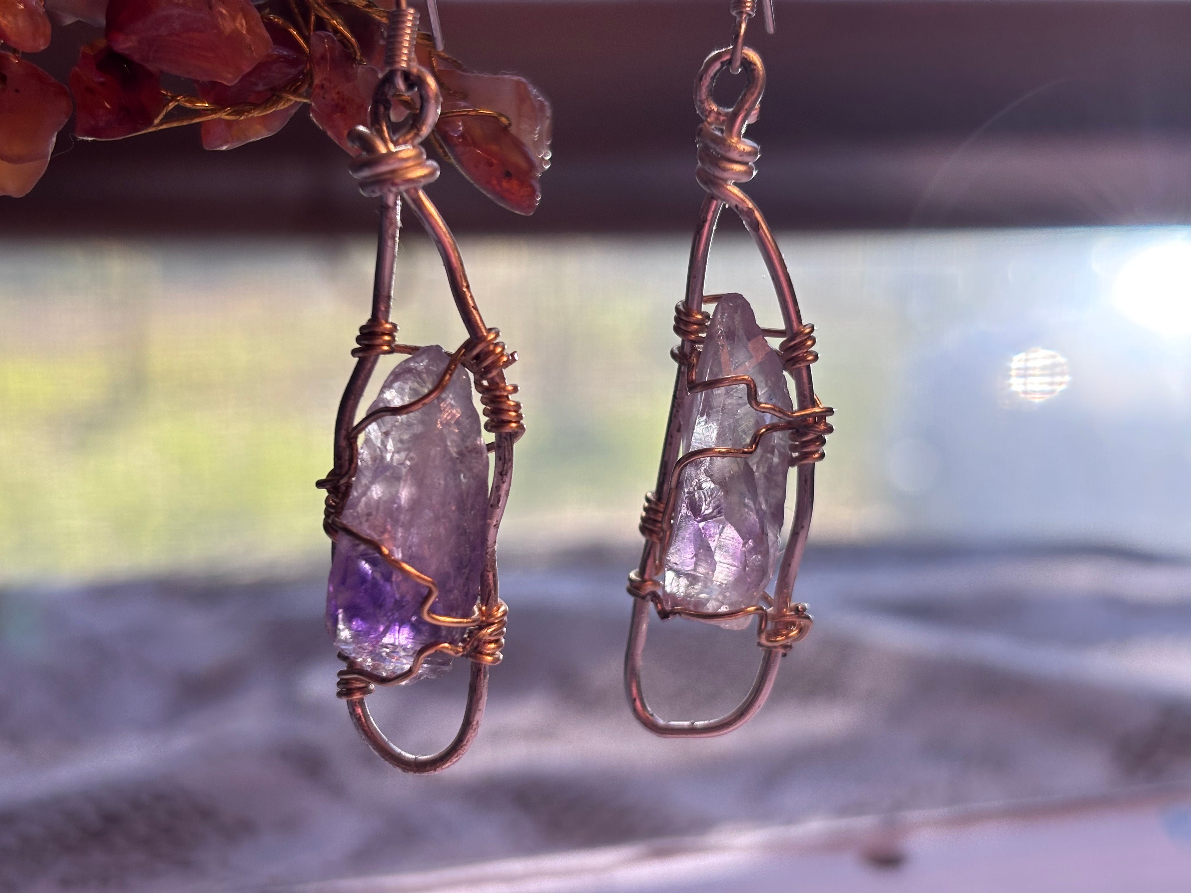 Rooted in legacy and wrapped with love.
Each amethyst stone is hand-coiled in silver and gold-tone wire — never drilled, keeping its natural frequency intact. A talisman of peace, intuition, and higher connection, inspired by my grandmother’s 60-year-old fig trees.